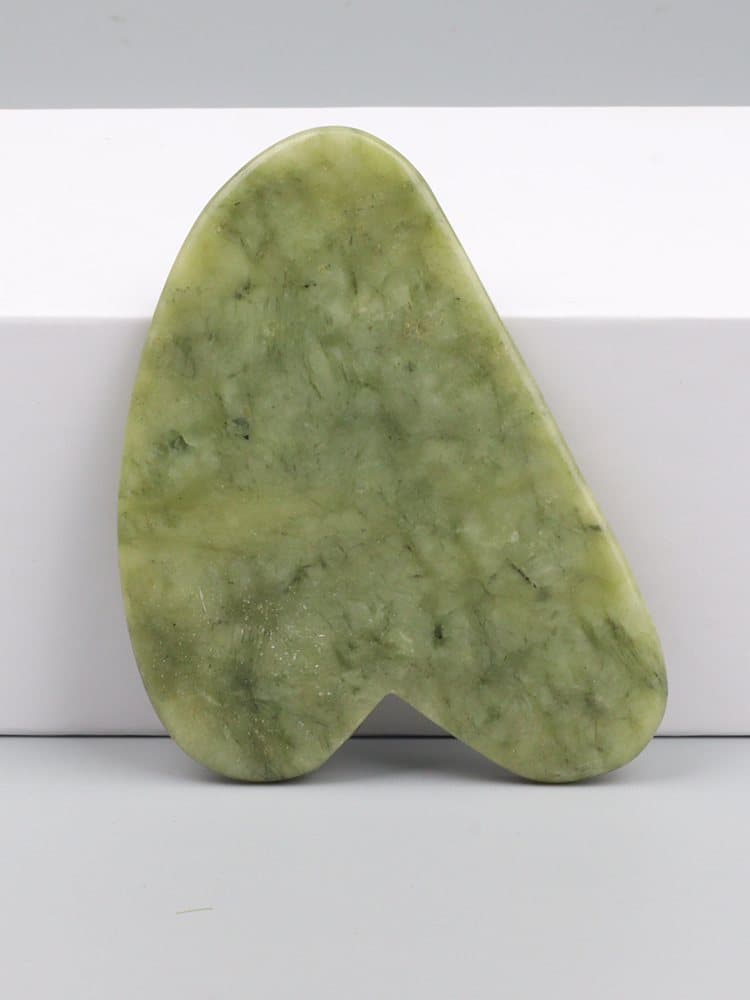 Gua sha en jade de Xiuyan